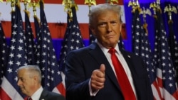 Donald Trump gestures as he stands on stage at a rally at the Palm Beach County Convention Center in West Palm Beach, Florida, on November 6. 