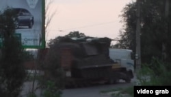 A Buk missile system without one rocket is sighted in Luhansk after the MH17 crash in July 2014.