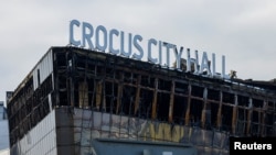 Urmările incendiului din timpul atacului de la sala de concerte Crocus, în apropierea Moscovei