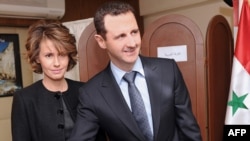 Syrian President Bashar al-Assad and his wife, Asma