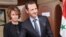 Syrian President Bashar al-Assad and his wife, Asma