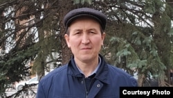Журналист и писатель Аким Кожоев.