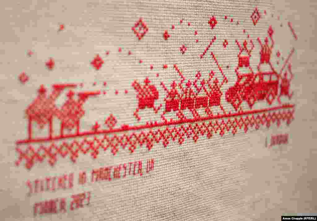 A detail of one panel showing protesters clashing with riot police in Brest.Bazlova says the textile political art, which mimics the patterns used on traditional vyshyvanka shirts, is impactful precisely because it is not shocking. Unlike distressing documentary imagery of the postelection violence, cross-stitch depictions are "nice, even though they're speaking about hard topics," the artist told RFE/RL.