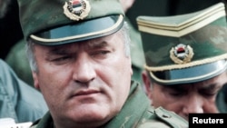 Ratko Mladic, the Bosnian Serb wartime commander (shown in 1993 photo), was found guilty in an international court of genocide and crimes against humanity committed during the Bosnian War from 1992-95. Mladic has died at the age of 84.
