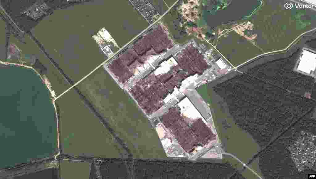 A Wildberries warehouse in Elektrostal, Russia, on May 16 and then on August 5 showing the facility nearly completely burned out after being hit in late July.