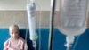 HRW says that some of the worst affected by sanctions were "Iranians who have rare diseases and/or conditions that require specialized treatment and are unable to acquire previously available medicines or supplies." (file photo of an Iranian boy receiving chemotherapy in June)