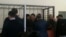 Подсудимых по делу «Таблиги Джамаат» заводят в зал суда. Астана, 22 января 2016 года.