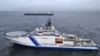 A Finnish Coast Guard vessel and the oil tanker Eagle S on the sea near Porkkalanniemi, Finland, on December 26.