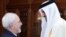 Qatar's Emir Sheikh Tamim bin Hamad Al-Thani (R) greets Iranian Foreign Minister Mohammad Javad Zarif during their meeting in Doha, October 3, 2017