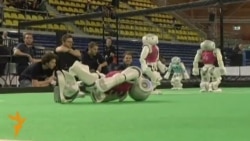 Football-Playing Robots Compete For 'RoboCup'