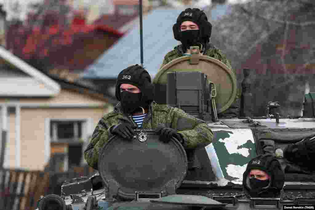 Servicemen are seen in a BMP-3 infantry fighting vehicle.&nbsp;Victory Day is an important holiday on Russia&#39;s calendar, with world leaders invited to Moscow. France&#39;s Emmanuel Macron and India&#39;s Narendra Modi had promised to attend this year&#39;s celebration.