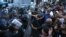 Armenia - Protesters scuffle with riot police near a police station seized by opposition gunmen, Yerevan, 19Jul2016.