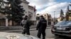 CZECH REPUBLIC -- Czech police officers stand guard in front of the Turkish embassy in Prague, February 26, 2018