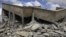 A house lies in rubble after a NATO airstrike near the village of Shal Ghouda in western Libya on August 11.