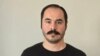 Hossein Ronaghi, a political activist, sewed his lips in a protest action