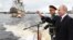 Владимир Путин и министр обороны России Сергей Шойгу принимают морской парад в Санкт-Петербурге, 25 июля 2021 года
