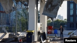 The aftermath of a Russian drone strike on a gas station in Kyiv on September 15. 