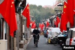 Beijingul pregătit pentru cel de-al 20-lea Congres al Partidului Comunist, care începe duminică. Imagine din 14 octombrie.