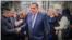 The president of Bosnian entity Republic of Srpska, Milod Dodik, greets supporters in Banja Luka after his sentence in Sarajevo on February 26.