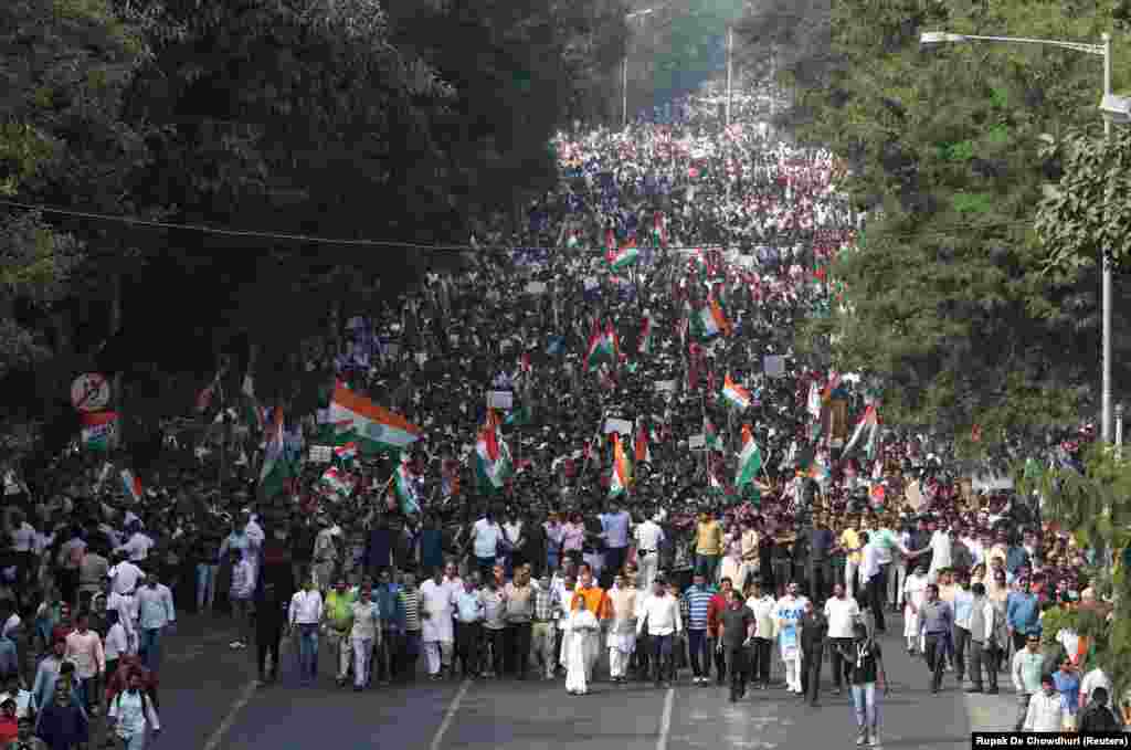 Mamata Banerjee, the Chief Minister of West Bengal, and her party supporters attend a protest in Kolkata on December 16.