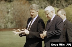 Clinton and Yeltsin take a walk during the Vancouver Summit on April 3, 1993.
