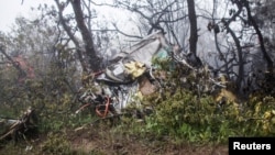 A view of the wreckage of a helicopter that crashed in northwestern Iran, killing Iranian President Ebrahim Raisi along with several other top officials.