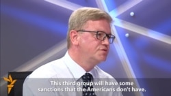 Fuele: EU Working On New Sanctions Against Russia