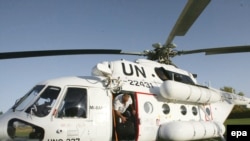 A UN helicopter arrives to evacuate UN workers in Herat, in western Afghanistan.