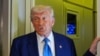 US President Donald Trump speaks on Air Force One at Abu Dhabi International Airport before departing, Friday, May 16, 2025, in Abu Dhabi, United Arab Emirates. 