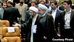 File photo-Head of Judiciary Sadegh Larijani and President Hassan Rouhani.