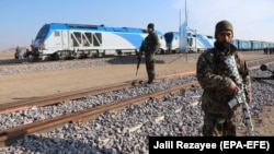 Afghan soldiers patrol next to the Herat-Khaf railway line in the Ghoryan district of Herat Province. (file photo)