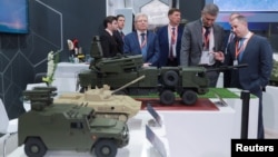 Russian weapons are displayed at the International Defense Exhibition and Conference in Abu Dhabi on February 20.