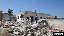 Сирійське місто Аль-Ядуда після застосування бочкових бомб, 2 травня 2015