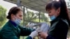 Kazakh zookeepers vaccinate a goose at a zoo in Almaty in September.