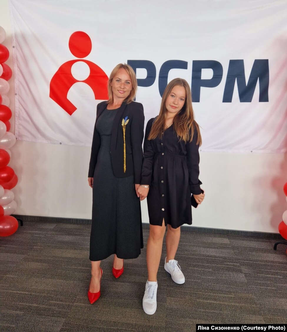 Lina Syzonenko dhe vajza e saj në Varshavë, Poloni.