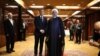 File photo - France's president Emmanuel Macron (L) greets Iranian president Hassan Rouhani at the Millennium Hotel near the United Nations on September 18, 2017, in New York. 