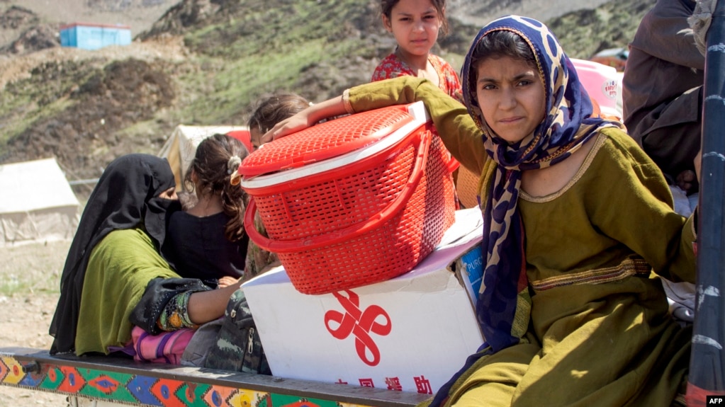 Afghan refugees deported from Pakistan arrive with their belongings at a makeshift camp near the Afghanistan-Pakistan border in Torkham, Nangarhar Province, on April 7.