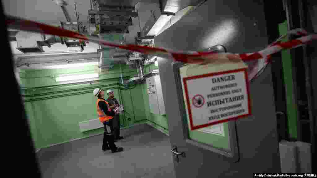 Workers at Chernobyl&#39;s New Safe Confinement (NSC) inspect new equipment. Two years after the structure was put into position, containment systems are still being installed and tested.&nbsp;&nbsp;The cost of the shield was almost $1.6 billion, with funding coming from the European Bank for Reconstruction and Development.&nbsp;