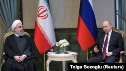 Russian President Vladimir Putin meets with his Iranian counterpart Hassan Rohani in Ankara, April 4, 2018