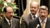 Al-Zawba'i (right) with al-Maliki (left) and fellow Deputy Prime Minister Barham Salih (file photo)