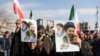People gather in support of Iran's new supreme leader Mojtaba Khamenei, in Tehran