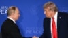 US President Donald Trump (R) and Russian President Vladimir Putin shake hands at the end of a joint press conference after participating in a US-Russia summit on Ukraine at Joint Base Elmendorf-Richardson in Anchorage, Alaska, on August 15, 2025.