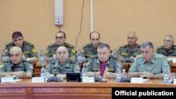 Armenian - Lieutenant-General Artak Davtian (second from right), the chief of the Armenian army's General Staff, and other officers conclude "staff negotiations" with a visiting Russian military delegation, Yerevan, July 17, 2021.