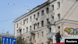 ფოტო არქივიდან, დრონებით შეტევის შედეგად დაზიანებული სახლი ვორონეჟში