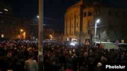 Armenia- Opposition supporters protest outside the Armenian police headquarters in Yerevan , February 23, 2021.