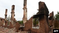 Разрушенное здание в Донецкой области, Украина, 23 сентября 2014 года. 