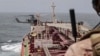 The US military enforces the blockade of Iranian ports on July 25 amid a pause in tit-for-tat strikes by the US and Iran in photo released by CENTCOM.