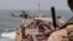 The US military enforces the blockade of Iranian ports on July 25 amid a pause in tit-for-tat strikes by the US and Iran in photo released by CENTCOM.
