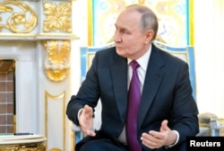 Putin îi cere scuze președintelui azer Ilham Aliyev