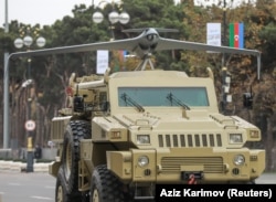 An Azerbaijani Army armored vehicle with a mounted UAV